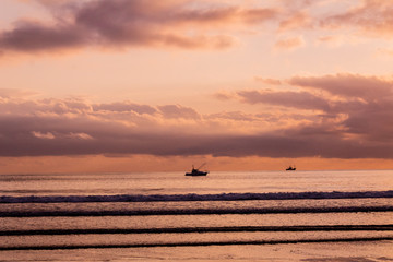 a beautiful sunrise on the beach of La Salve, in Laredo, cantabria