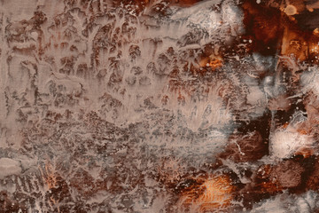 abstract textural background with brown and graybranchy paint lines and cracks with white divorces,...