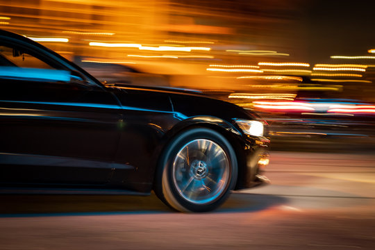 Black Car Racing At Night