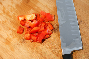 Cut up Veggies, red peppers on a cutting board