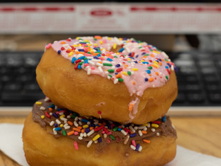 Close Up Iced Donuts on a Desk