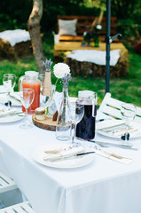 Wedding table setup. Elegant wedding table decorated with flowers.