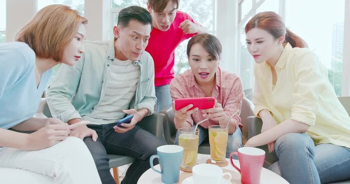 friends watch ballgames on phone