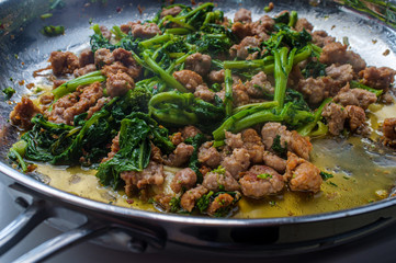 Cooking Sausage Broccolini