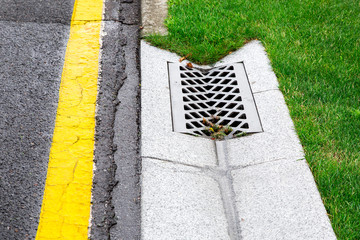 drainage system edge tray with concrete hatch for rainwater drainage into the sewer on side of...