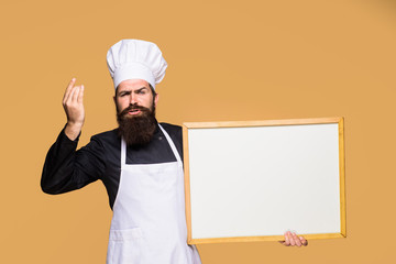 Chef menu. Man cook show empty menu chalkboard with copy space. Advertisement. Happy chef hold blackboard. Smiling chef, cook or baker with blank board. Empty menu chalkboard with copy space for text.