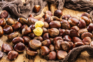 Roasted chestnuts served on an old table