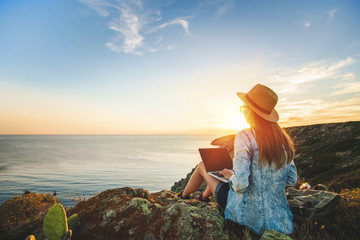 Female traveller at the cliff