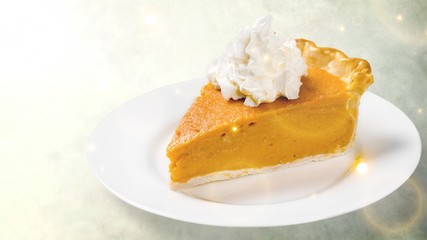 Pumpkin Pie Slice and creme on white plate