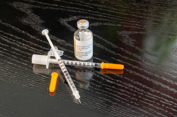 Insulin syringe and insulin bottle for Type 1 diabetics