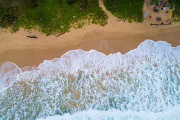 Sea wave on white sand beach turqouise water