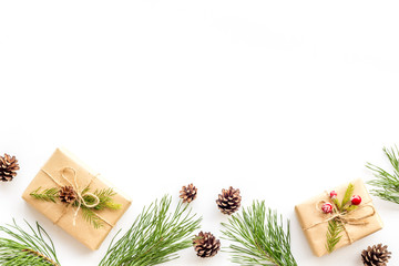 New Year frame with fir branches and present box mockup on white background top view space for text