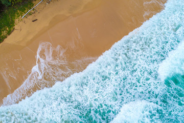 Fototapeta premium Sea wave on white sand beach turqouise water