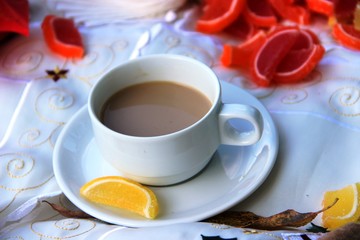 cup of tea and cookies on wooden table