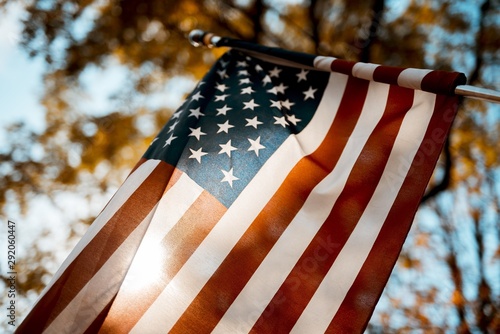 Flag of the united states shot from a low angle with a blurred background