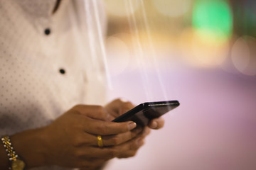 Asia woman using smartphone working,playing with happy