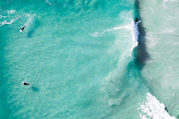 Beach holidays pictures Drone views of beach, waves, surfers, swimmer, sea, ocean in Australia....