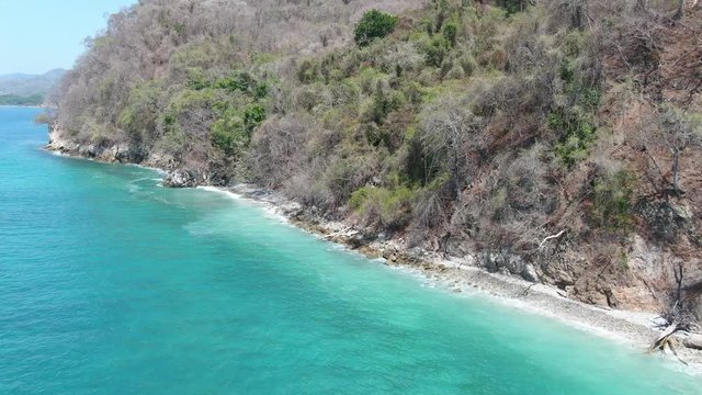 Aerial drone video of a tropical paradise beach in Playa Quesera in Curu, Costa Rica