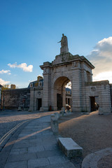 Fototapeta na wymiar Grand entrance to Royal William Yard in Plymouth, UK. It was once the Royal Navy's victualling yard.