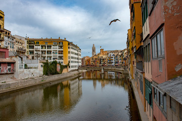 Colourful buildings line the banks of the river Onya in Girona, Spain