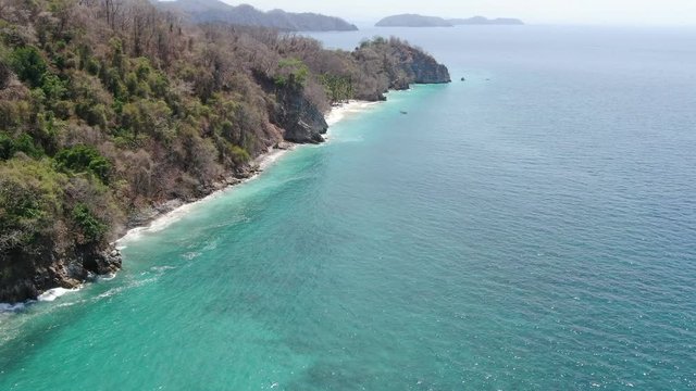 Aerial drone video of a tropical paradise beach in Playa Quesera in Curu, Costa Rica