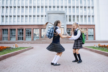 Two Schoolgirls in uniform.