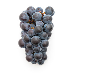 fresh black grapes on white background