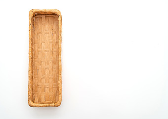 Wicker basket on white background