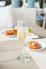 sparkling wine glass on table in cafe restaurant