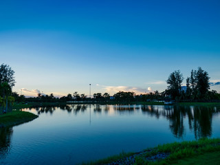 Scenic view of the lake with colorful lighting twilight time , Nong Prajak Park, Udon Thani, Thailand
