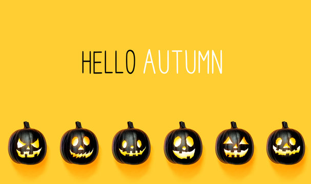 Hello autumn with black colored pumpkin lanterns