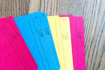 Collection of Multi Colored File folders on a table