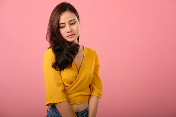 studio portrait of asian woman in casual clothing feeling sad unhappy depressed