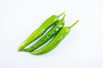 Fresh green green pepper on white background