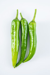 Fresh green green pepper on white background