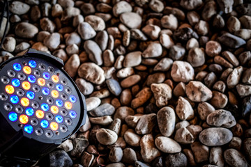 ground spotlight on stone rock floor