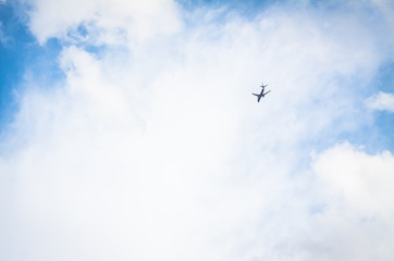 plane on sky. plane and blue sky with white clouds background.