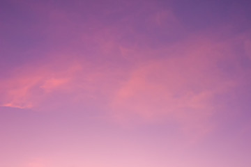 Evening sky with pink clouds, sunset and transition to regime time .