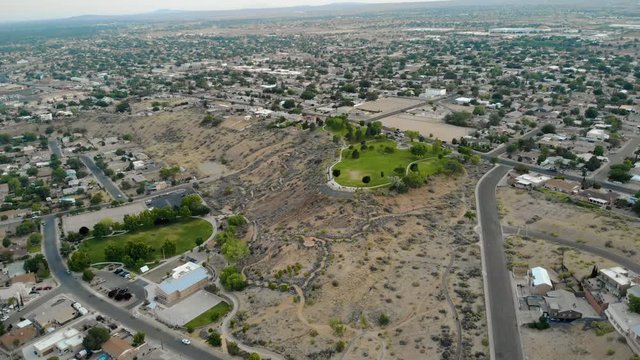 Aerial footage of Pat Hurley Park in Albuquerque, New Mexico near golden hour.