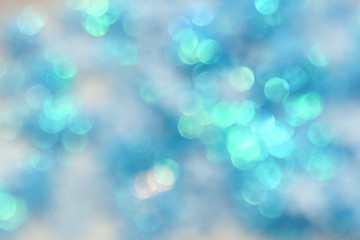 Obraz premium blur glitter, bokeh, defocused blue festive background, texture. Xmas abstract background .
