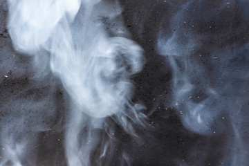 The texture of charred metal and smoke as an abstraction background