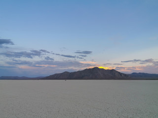Sunrise and Sunset over the Cracked Earth Dry Arid Nevada Desert at Burning Man