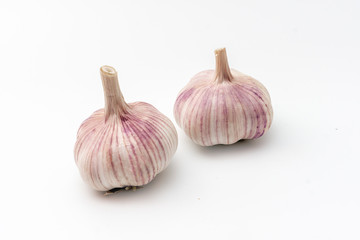 Ripe fresh garlic isolated on white background