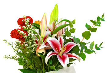 Bouquet / flower arrangement of different flowers isolated on white