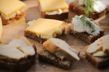 Breakfast useful porridge and sandwiches is on the table
