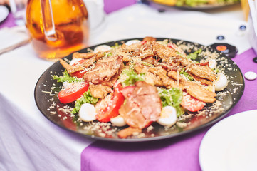 Colorful and appetizing cold cuts and salads