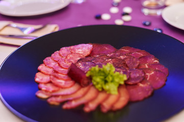 Colorful and appetizing cold cuts and salads