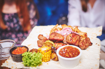 Colorful and appetizing cold cuts and salads