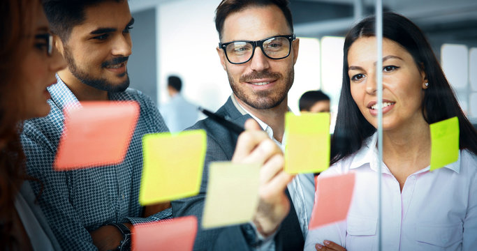 Collaboration and analysis by business people working in office