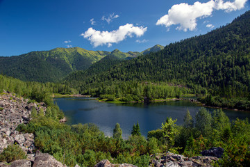 Fototapeta na wymiar Mountain lake. High mountains. Clear water. Beautiful nature. Lake. High mountain lake. Nature. Mountains.